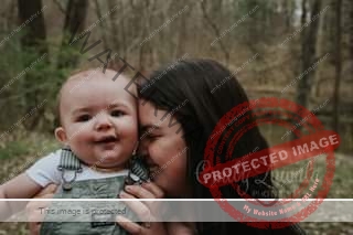 May be an image of 1 person, baby, tree, outdoors and text